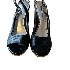Gianni Bini black snake print platform heels.